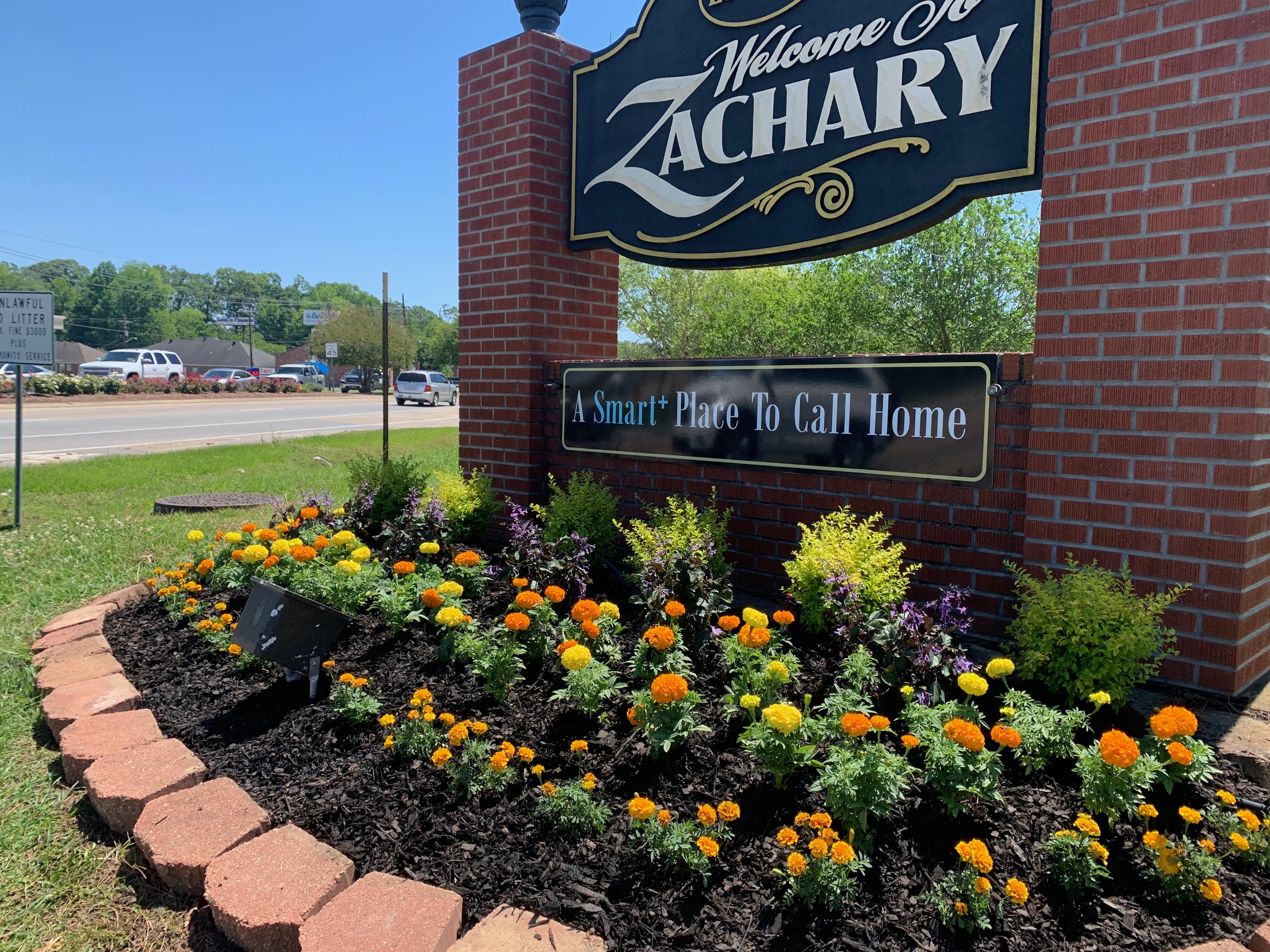 City of Zachary Seeking Proposals for Median Mowing, Lawn and Flowerbed Maintenance Service